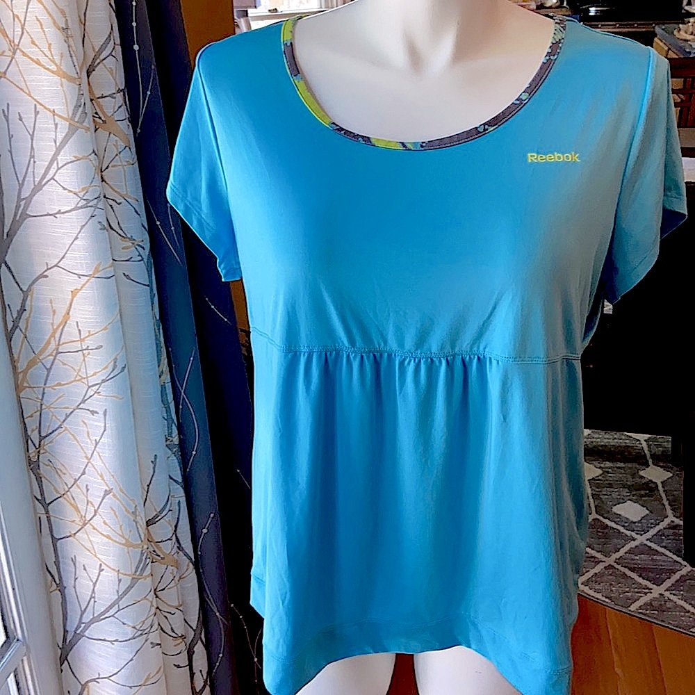 18/20 REEBOK TURQUOISE SHORT SLEEVED SCOOP NECK EMPIRE WAIST WORKOUT LOU…